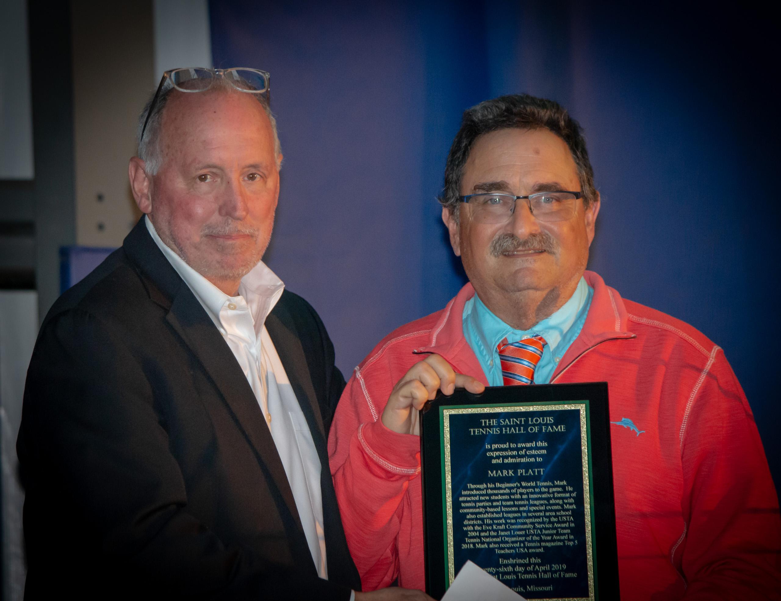 Mark and Rick Randall pose with Mark's plaque.